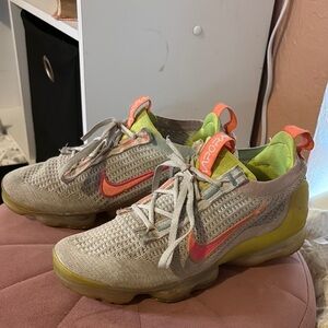 Nike Flyknit Sneakers with Red and Green Accents